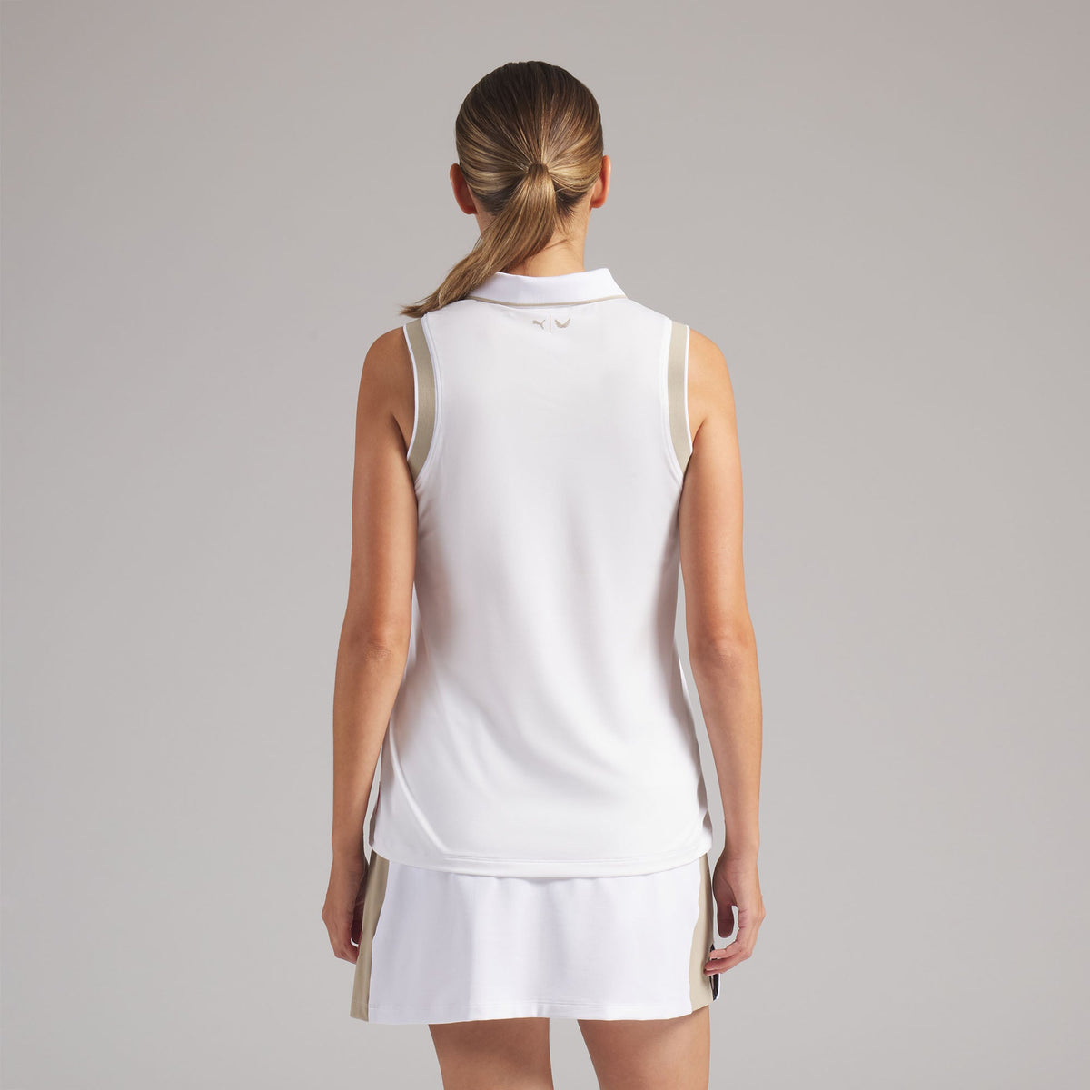 Women's Volition Solid Sleeveless Golf Polo