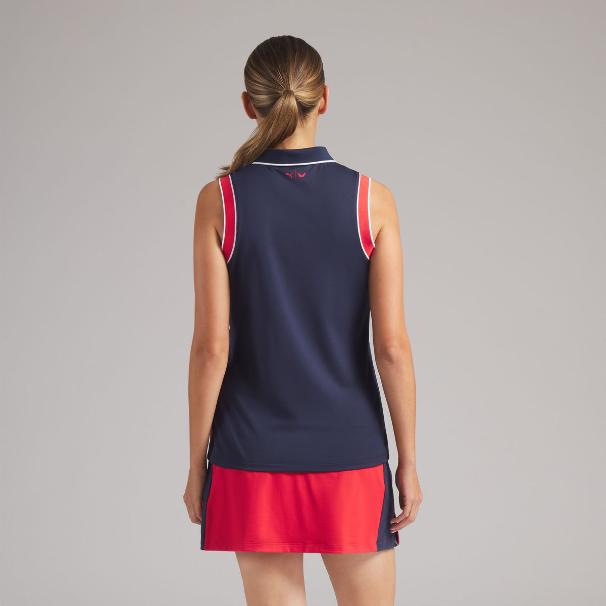 Women's Volition Solid Sleeveless Golf Polo