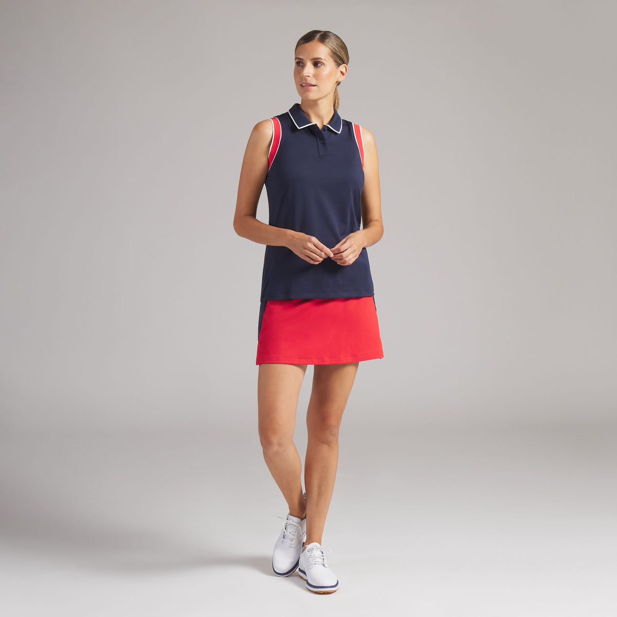Women's Volition Solid Sleeveless Golf Polo